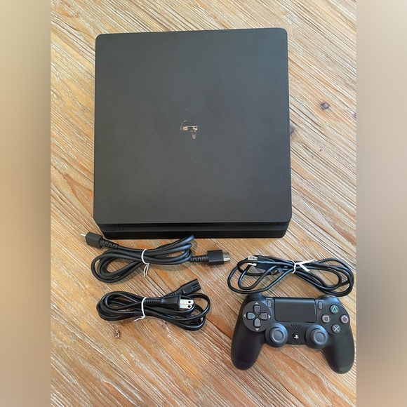 Sony PS4 Gaming Console with DualShock 4 Wireless Controller
